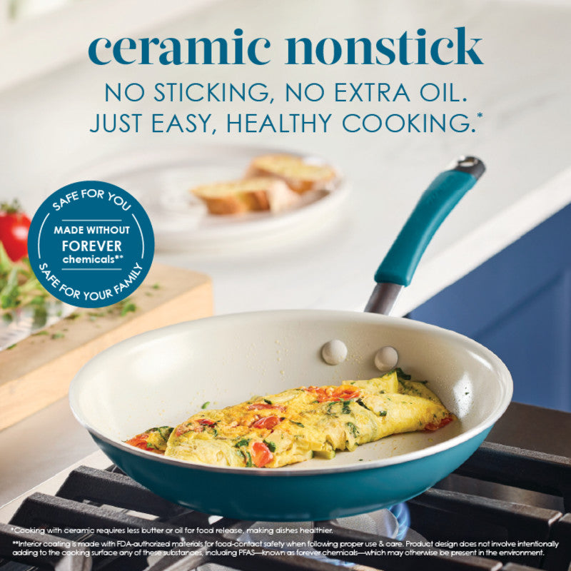 Omelet cooking in an 8-Piece Ceramic Nonstick Cookware Set on the stove.