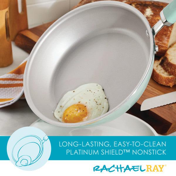 A fried egg in a Nonstick Induction Deep Frying Pan with bread on the side.