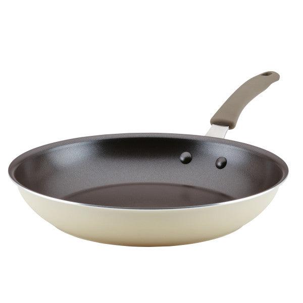 Introducing the Cook + Create Nonstick Frying Pans: A high-performance frying pan designed with a stylish light-colored exterior and a durable dark interior, crafted from thicker gauge aluminum.