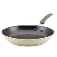 Introducing the Cook + Create Nonstick Frying Pans: A high-performance frying pan designed with a stylish light-colored exterior and a durable dark interior, crafted from thicker gauge aluminum.