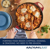 A person serves pasta from a 12-Inch NITRO Cast Iron Skillet on a wooden table.