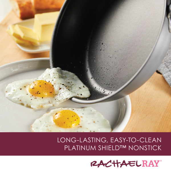 11-Piece Nonstick Cookware Set easily slides eggs beside butter on a board.