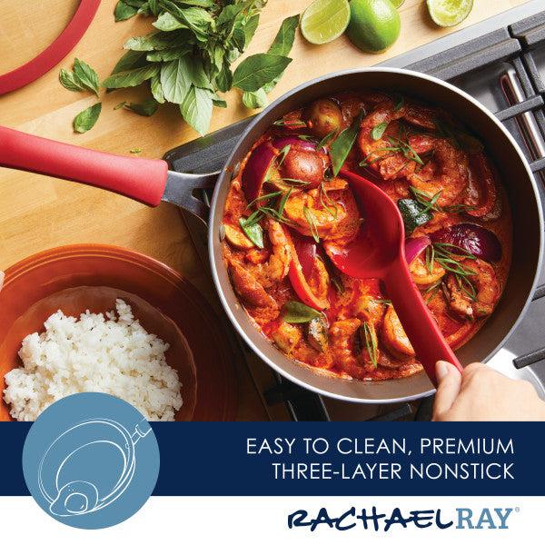 The 3-Quart Cook + Create Nonstick Sauté Pan with Lid, holding a tomato dish and a bowl of rice, sits elegantly on the stove, ready for dinner.