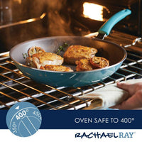 Chicken cooking in a Cook + Create Nonstick Frying Pan inside an oven, safe up to 400 degrees.