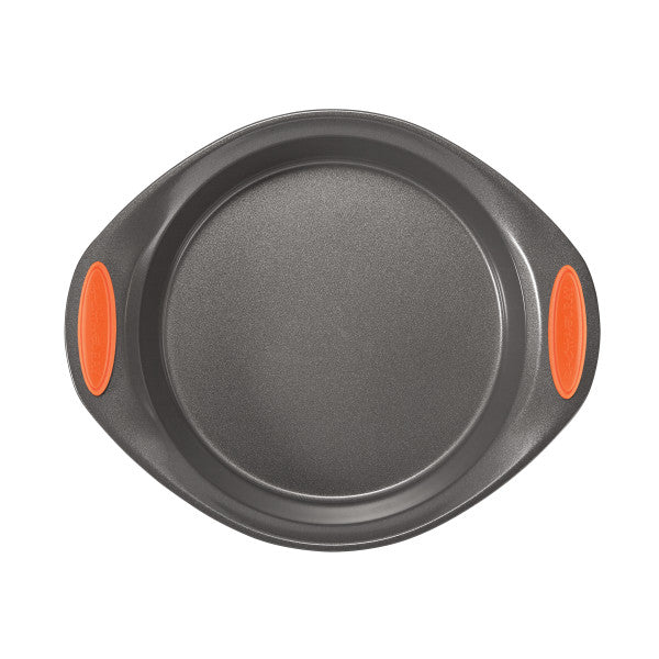 Round baking pan, part of the 5-Piece Nonstick Bakeware Set, featuring handles with orange grips, made from heavy gauge steel and safe for oven use up to 500°F.