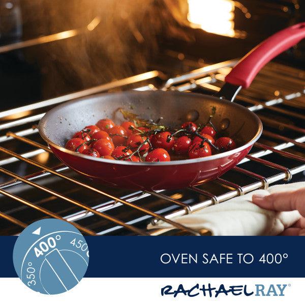 Cook + Create Nonstick Cookware Sets include a red frying pan with tomatoes, designed for scratch resistance and safe to use in an oven up to 400°F.