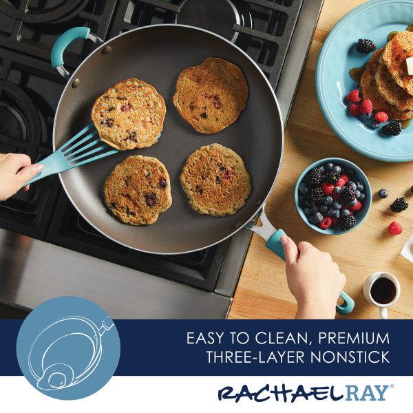 Using the Cook + Create Nonstick Frying Pan to cook pancakes on the stove, with the delightful aroma wafting from a bowl of berries nearby.