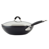 Ceramic Nonstick Stir Fry Pan with glass lid and long handle on white background.
