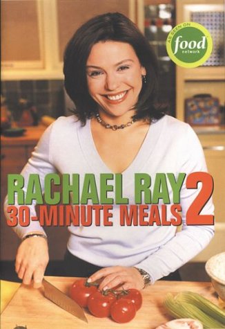 Person cutting tomatoes in a kitchen on a cookbook cover.