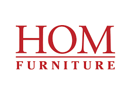 HOM Furniture logo in red uppercase letters on a white background.