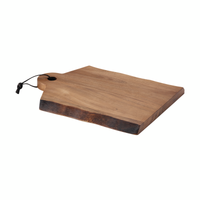 Wooden cutting board with a burnished edge and a hanging loop.