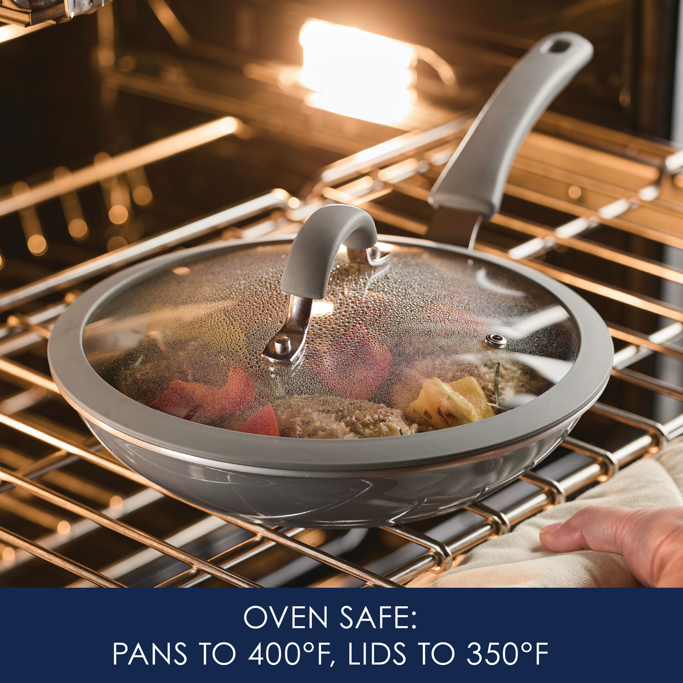 Skillet with lid and food in oven; safe up to 400°F for pan, 350°F for lid.