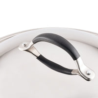 Close-up of the handle on a 14-Inch Stainless Steel Domed Lid, showcasing a sleek black and silver design.