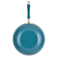 Teal Ceramic Nonstick Stir Fry Pan with handle, bottom view from above.