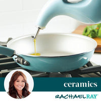 A ceramic frying pan on the stove features the EVOO Bottle 24-Ounce with a stainless steel pour spout, precisely pouring oil in the promotional image.