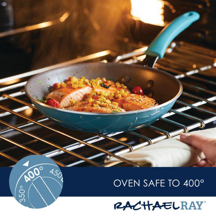 A Cook + Create Nonstick Cookware Set's blue frying pan, filled with food, placed in an oven set to 400 degrees, demonstrating its nonstick feature.