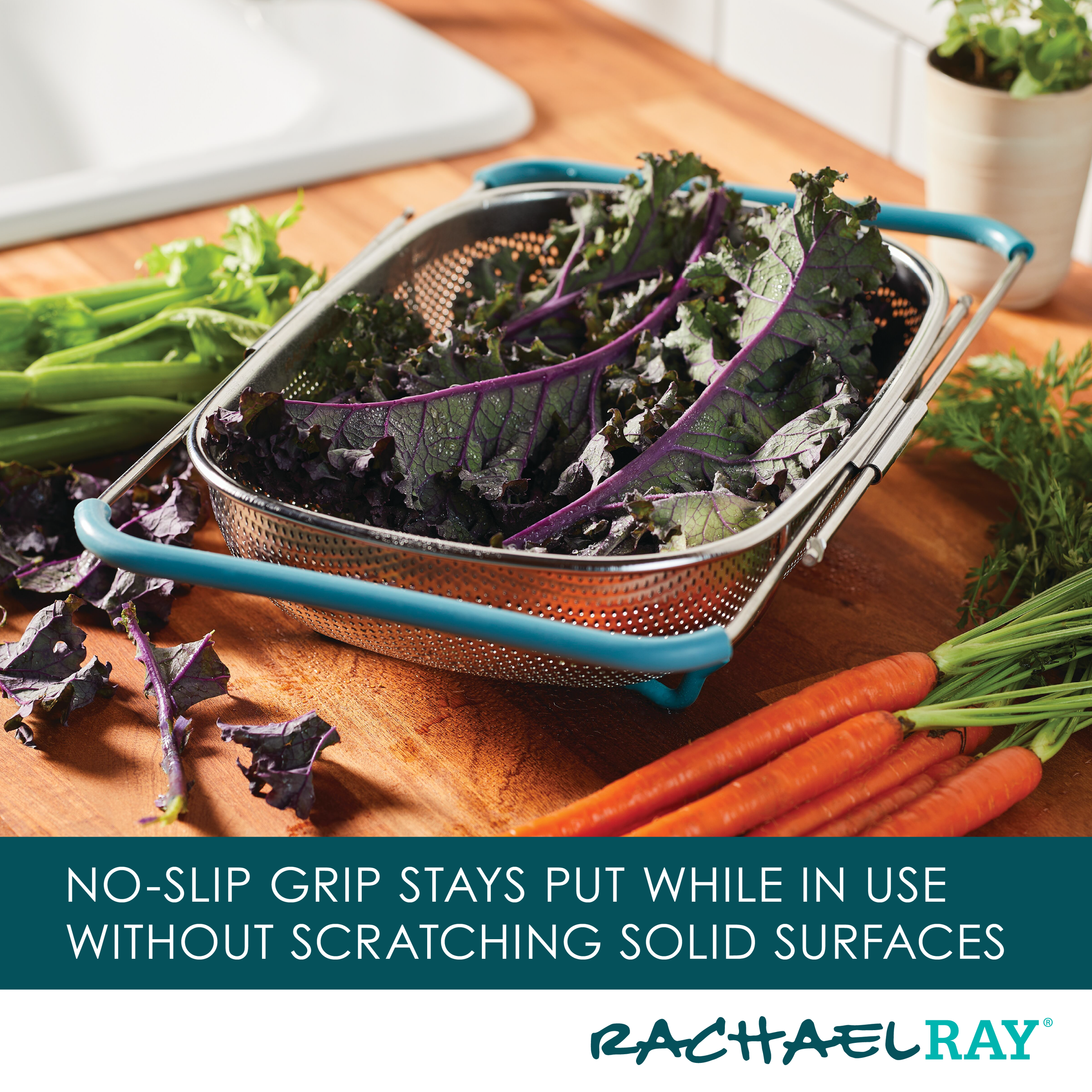 A 4.5 Quart Over-the-Sink Colander filled with vibrant vegetables rests on the kitchen counter, its expandable arms reaching gracefully toward the nearby sink.