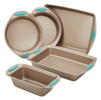 This 5-Piece Nonstick Bakeware Set includes five sturdy heavy gauge steel pans, each equipped with teal grips, providing a variety of shapes and sizes to meet all your baking needs.