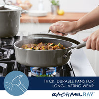 A person is carefully placing the lid on a 3-Quart Cook + Create Nonstick Sauté Pan that sits on the stove, ensuring an even and efficient cook.