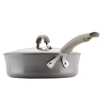 3-Quart Cook + Create Nonstick Sauté Pan with Lid, featuring a handle, oven-safe in gray, viewed from the side.