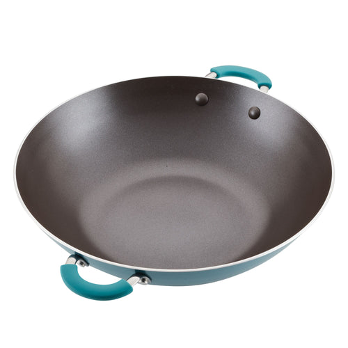 A 14-inch Cook + Create Nonstick Wok featuring scratch-resistant blue handles.