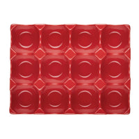 With its versatile and modern red hue, the 12-Cup Ceramic Egg Tray features twelve square, indented compartments, ideal for serving hors d'oeuvres.