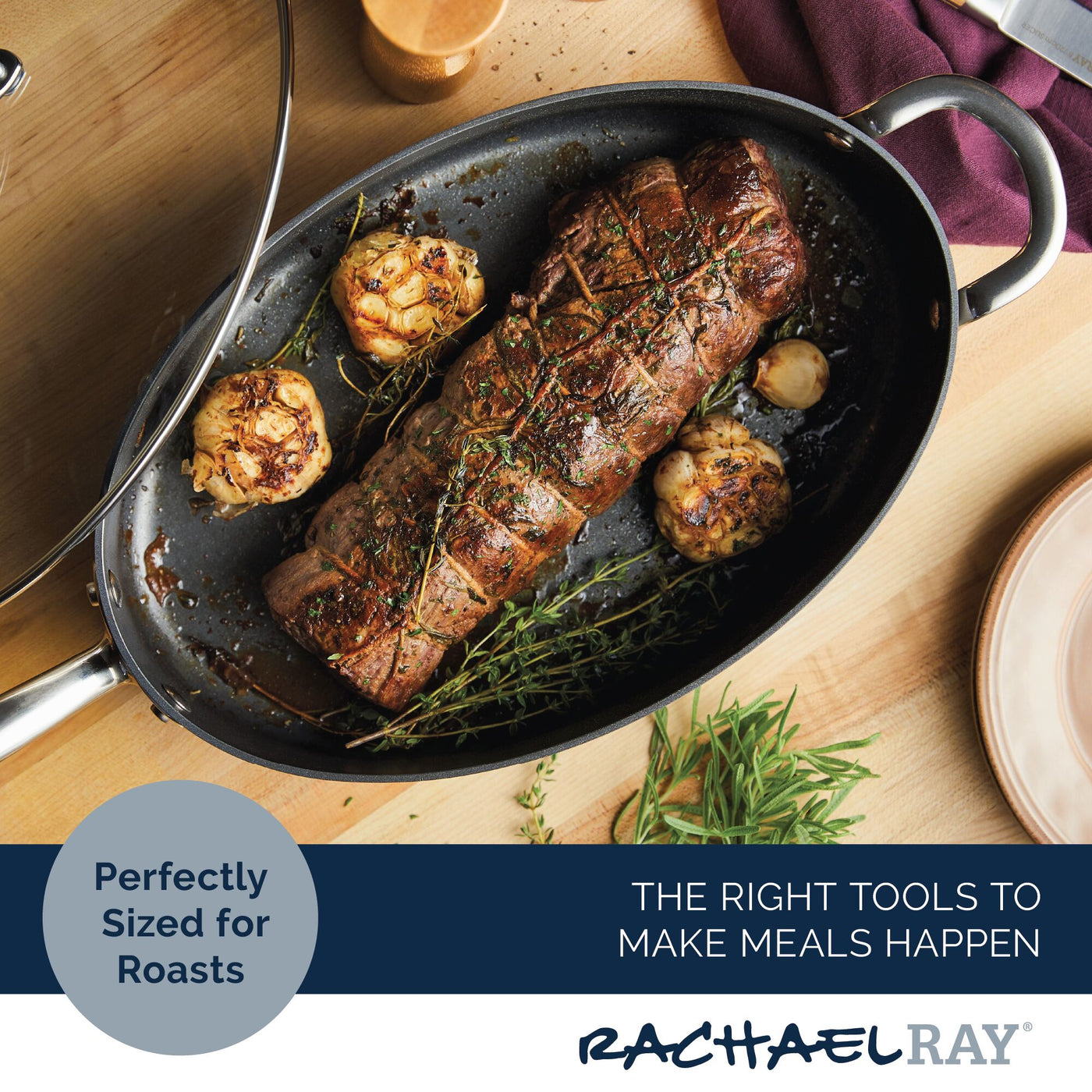 Garlic-infused roasted meat sizzles in a 5-Quart Professional Hard Anodized Nonstick Oval Sauté Pan with Lid, highlighting the versatility of its nonstick cookware design.