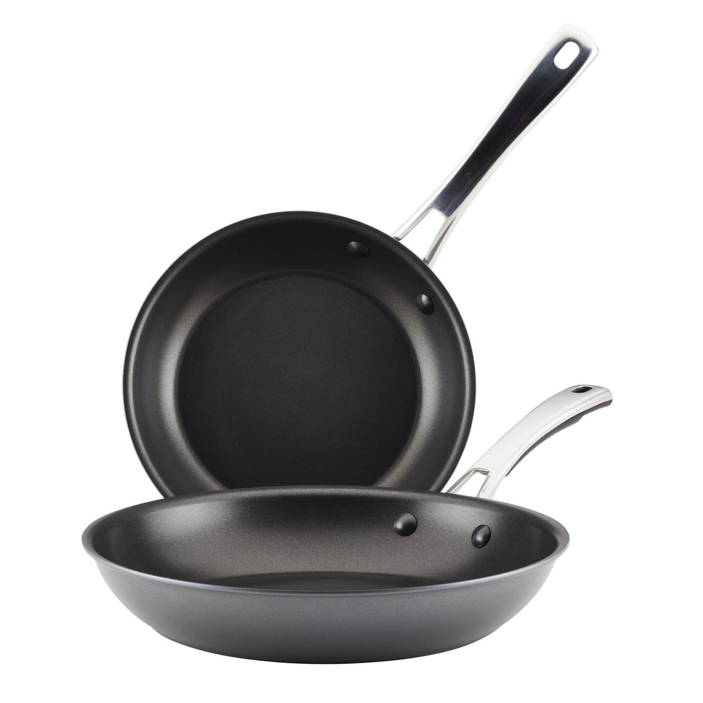 The 2-Piece Cook + Create Hard Anodized Nonstick Frying Pan Set includes two black frying pans crafted from hard-anodized aluminum, featuring metal handles and designed to nest together for convenience.