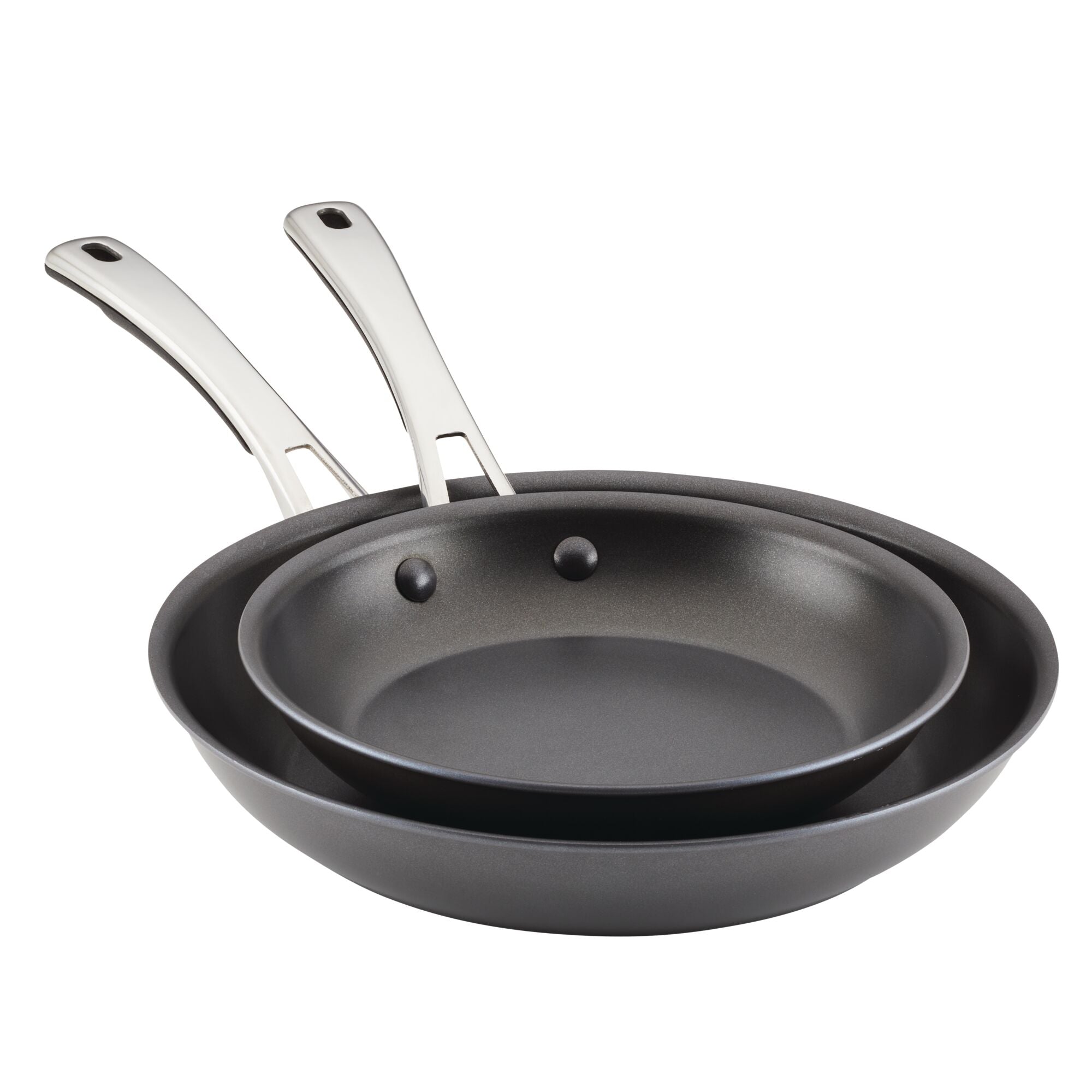 The two frying pans from the 2-Piece Cook + Create Hard Anodized Nonstick Frying Pan Set are stacked neatly, showcasing their gleaming stainless steel handles.