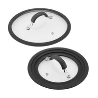 The 10-Piece Cook + Create Hard Anodized Nonstick Cookware Set includes two glass pot lids with black silicone rims and handles, making them the ideal match for a sleek, nonstick cooking experience.