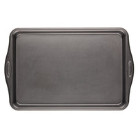 A piece from the 10-Piece Cook + Create Hard Anodized Nonstick Cookware Set, featuring a rectangular nonstick metal baking sheet with handles made from hard-anodized aluminum, rests on a pristine white background.