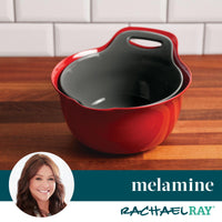 A 2-Qt. & 3-Qt. Nesting Mixing Bowl, featuring a non-slip rubberized bottom, sits elegantly on the wooden countertop, its handle poised for easy use.