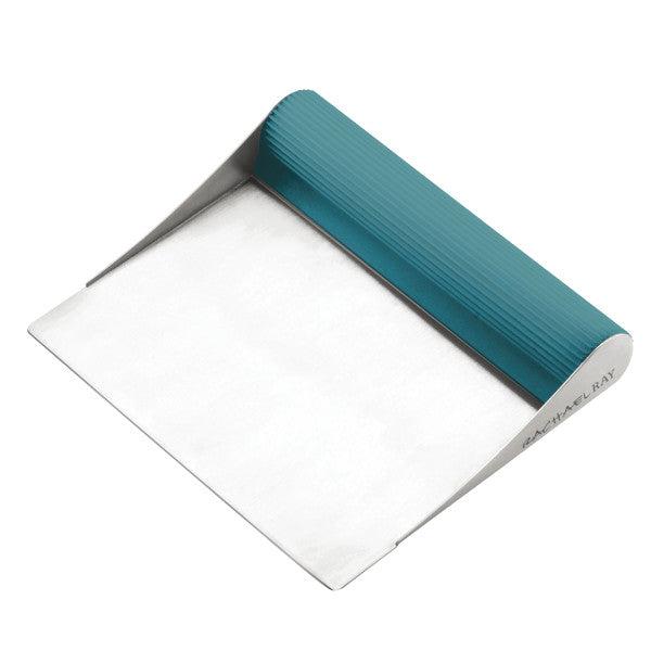 The Bench Scrape - Rach's Food Mover, featuring a stainless steel blade and a teal handle, is ideal for transferring food or handling all your bench scrape tasks.
