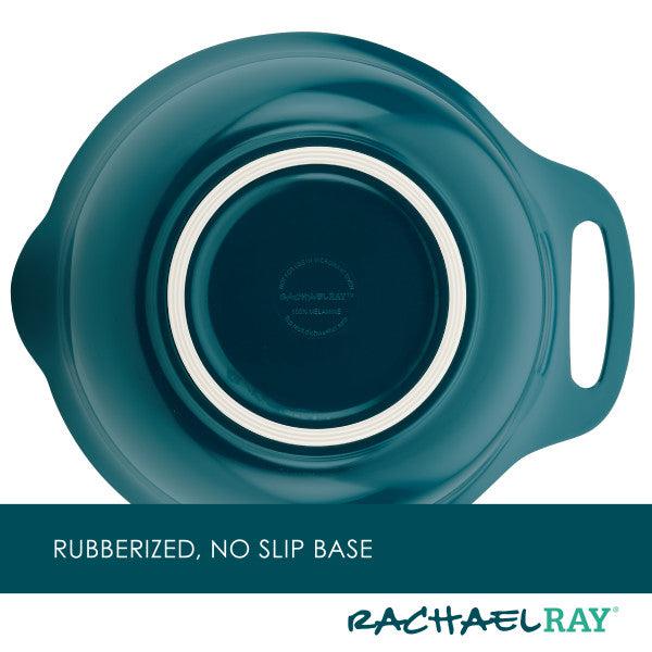 A top view of a teal rubberized container from the 10-Piece Mix, Measure, and Utensil Set, featuring a no-slip base that makes it an essential for kitchen mixing bowls or measuring cups.