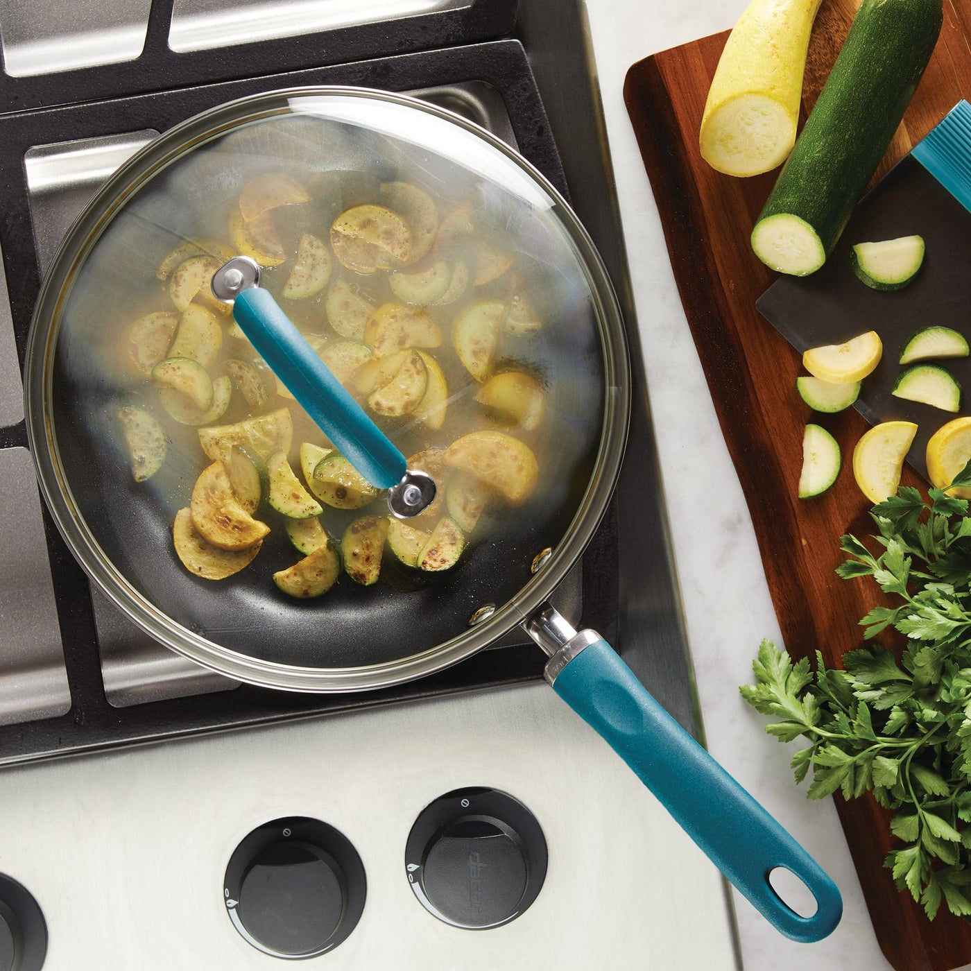 10.25-Inch Nonstick Deep Frying Pan steaming squash, veggies on the side.