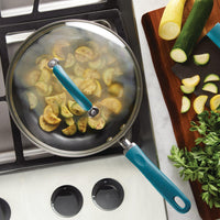 10.25-Inch Nonstick Deep Frying Pan steaming squash, veggies on the side.