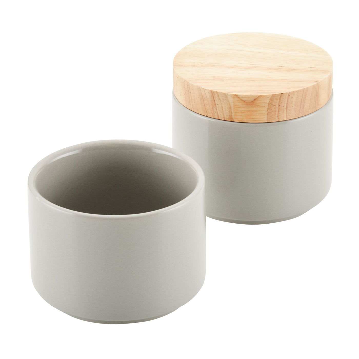 Two grey ceramic jars from the Stacking Spice Box Set, ideal for stacking storage, with one jar featuring a wooden lid.