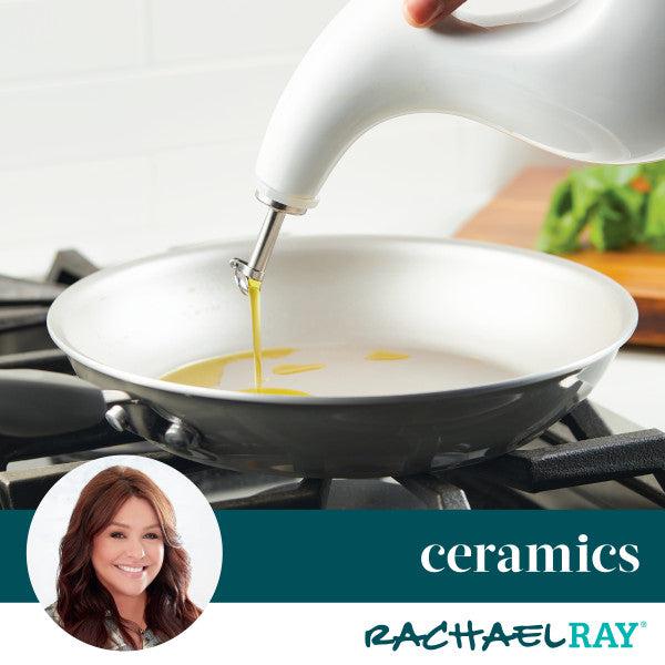 Pouring oil with precision from a 24-Ounce EVOO Bottle outfitted with a stainless steel pour spout into a ceramic pan on the stovetop.